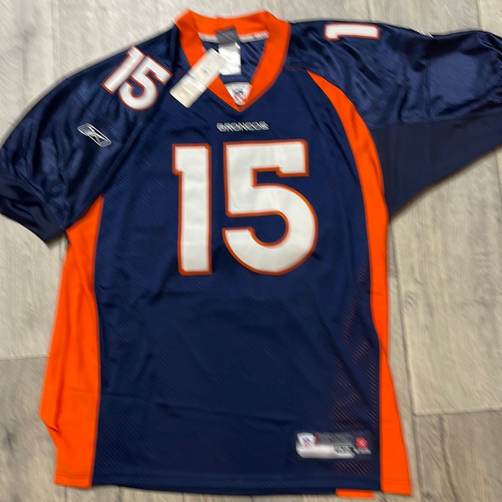 New (small stains on the number 15  men’s Broncos jersey Tebow number 15 size 52